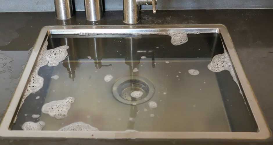 The Emergency Fix For Water Backing Up in Sinks Image